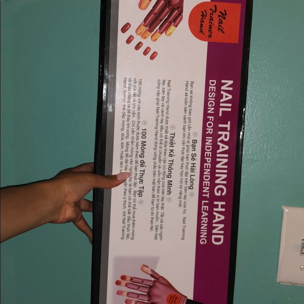 Nail training hand